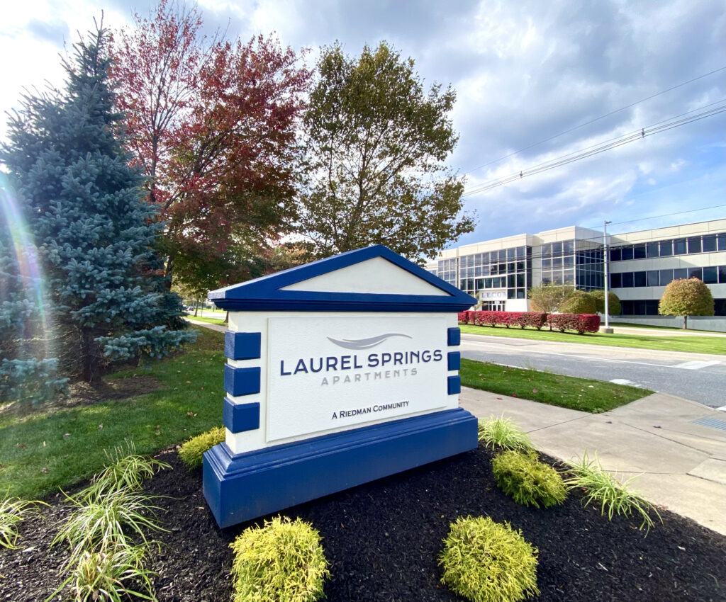 Image of the Laurel Springs Community sign and it's close proximity to LECOM. The sign sits at the main entrance of the community.