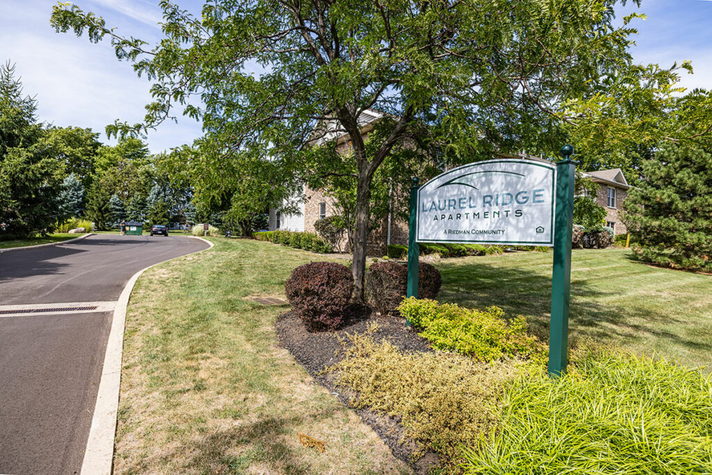Laurel Ridge Apartments community entrance sign welcoming visitors and residents.