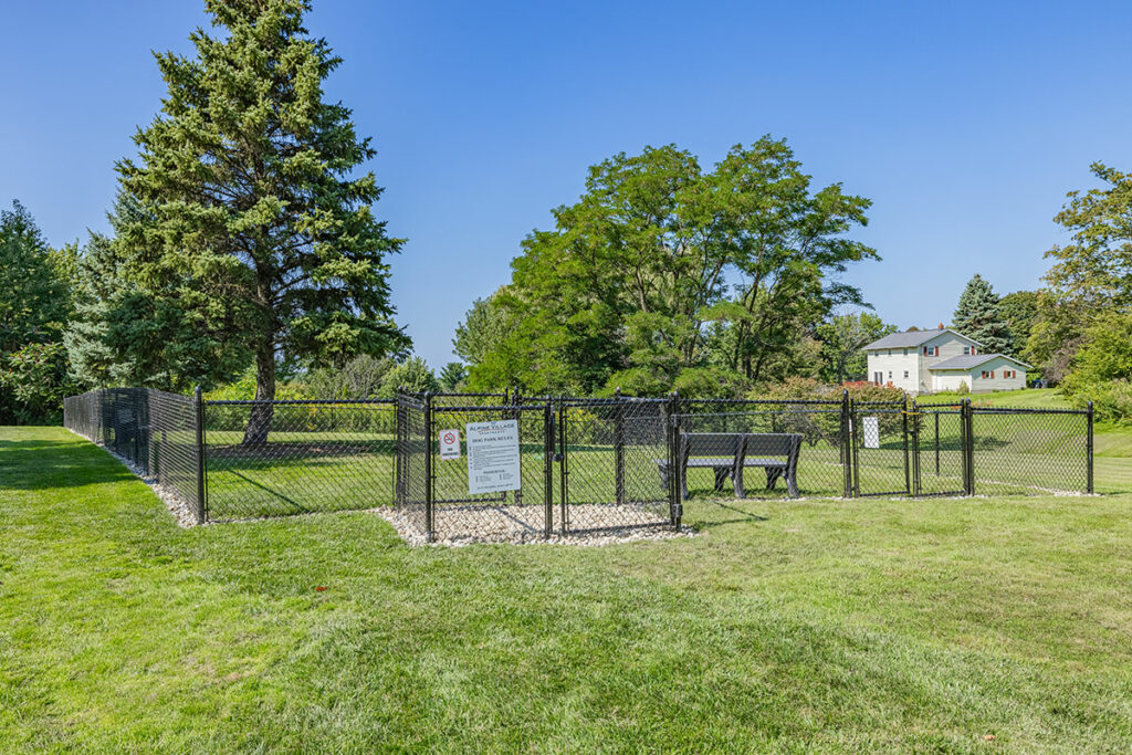 New added fenced in dog park with extra seating inside.