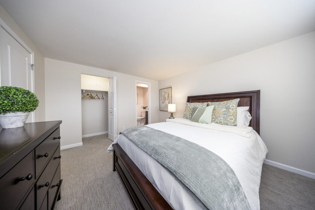 Spacious Master Bedroom Featuring Ample Closet Space and Private Ensuite Bathroom